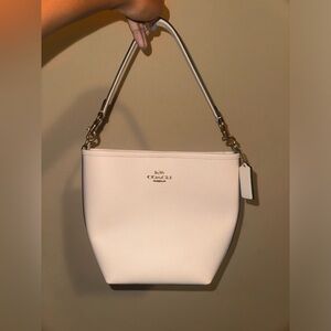 Cream coach bucket bag